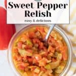 A jar of sweet pepper relish with a spoon, nestled next to a vibrant red pepper on a striped cloth. Recipe text overlay adds a flavorful touch.