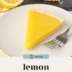 A slice of lemon tart on a white plate with a fork beside it. A lemon slice is elegantly placed in the background. Text overlay reads "lemon tart: an elegant classic dessert.