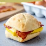 A bacon, egg, and cheese breakfast sandwich on ciabatta bread is shown with text indicating it's a Starbucks breakfast sandwiches copycat recipe from stetted.com.