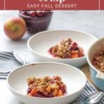 A group of bowls of food, including a delightful apple cranberry crisp.