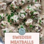 Overhead view of Swedish meatballs in creamy sauce, garnished with chopped parsley. Text overlay states "Swedish Meatballs - A Comfort Classic" with a URL for the recipe.