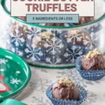 Cookie butter truffles in blue wrappers are elegantly arranged in a decorative container, captioned "How to Make Cookie Butter Truffles: 5 Ingredients or Less." These delightful treats blend simplicity and indulgence seamlessly.