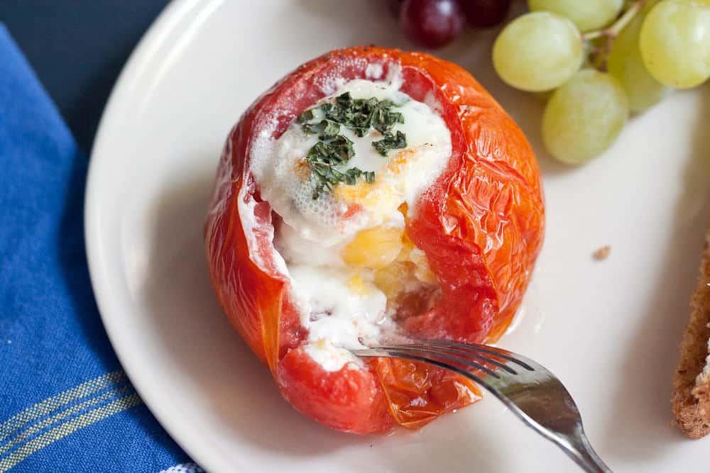 Baked eggs in tomatoes are a wonderful way to eat eggs in the summertime.