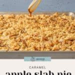 A baking sheet holds a caramel apple slab pie with a crumble topping. A whisk drizzles caramel sauce over the pie, enhancing its decadence. Text below reads "Caramel Apple Slab Pie with Crumble Topping.