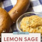 A close-up of lemon sage mustard in a glass bowl sits next to a pretzel on a blue and white checkered cloth. Text at the bottom reads "Lemon Sage Mustard - easy & delicious.