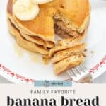 A stack of banana bread pancakes, topped with butter and fresh banana slices, sits partially eaten on a white and red plate. A fork rests nearby, ready for the next delicious bite.