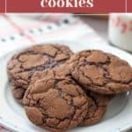 A plate of Mexican hot chocolate cookies is displayed on a festive tablecloth. The text above reads "hot chocolate cookies.