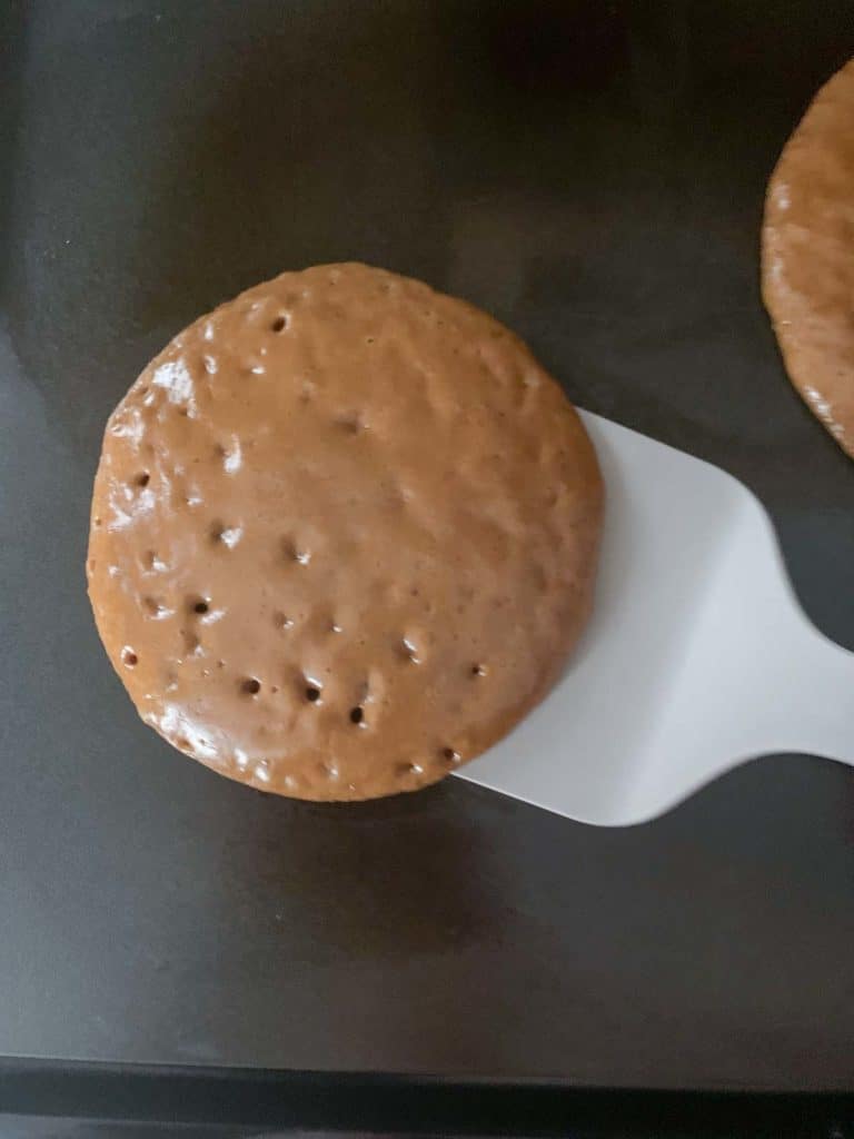 gingerbread pancake being flipped