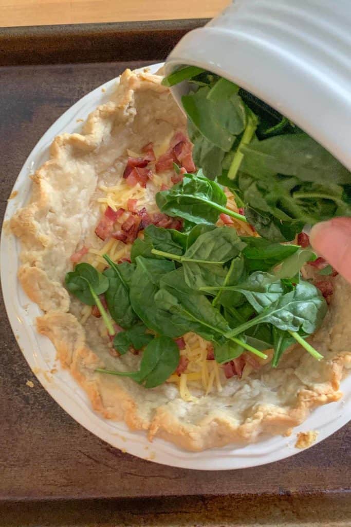 adding spinach to quiche crust