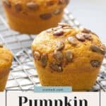 Three pumpkin muffins topped with pumpkin seeds are cooling on a wire rack, while the text "stetted.com" and "Pumpkin Muffins" is displayed below the image. Nearby, a jar of quick pickled cucumbers adds a refreshing twist to the scene.
