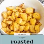 A bowl brimming with roasted rutabaga chunks rests on a black and white checkered cloth. A label reads "Easy Roasted Rutabaga".