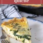 A delicious slice of spinach quiche sits invitingly on a plate, accompanied by a fork and a striped napkin in the background. Above it, the text proudly announces, "easy spinach quiche.