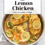 A pan of succulent lemon chicken, beautifully garnished with fresh lemon slices and aromatic herbs.