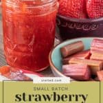 A jar of delightful strawberry rhubarb jam sits next to a bowl brimming with fresh rhubarb and strawberries.