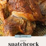 A cooked spatchcock turkey with crispy, golden-brown skin on a cooling rack, accompanied by the text "juicy spatchcock thanksgiving turkey.