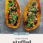 Two halves of delicata squash stuffed with chickpeas, vegetables, and herbs on a gray surface. Text reads "Vegetarian Stuffed Delicata Squash.