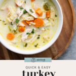 A bowl of turkey rice soup with carrots, celery, and parsley on a wooden board. Text reads "quick & easy turkey rice soup.