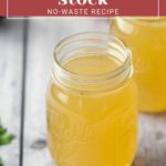 Jars of turkey stock on a wooden surface with parsley. Text on image reads "Turkey Stock: No-Waste Recipe.