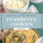 Close-up of white chocolate cranberry cookies in a basket, with a sign reading "White Chocolate Cranberry Cookies" and bowls of white chocolate chips and dried cranberries in the background.