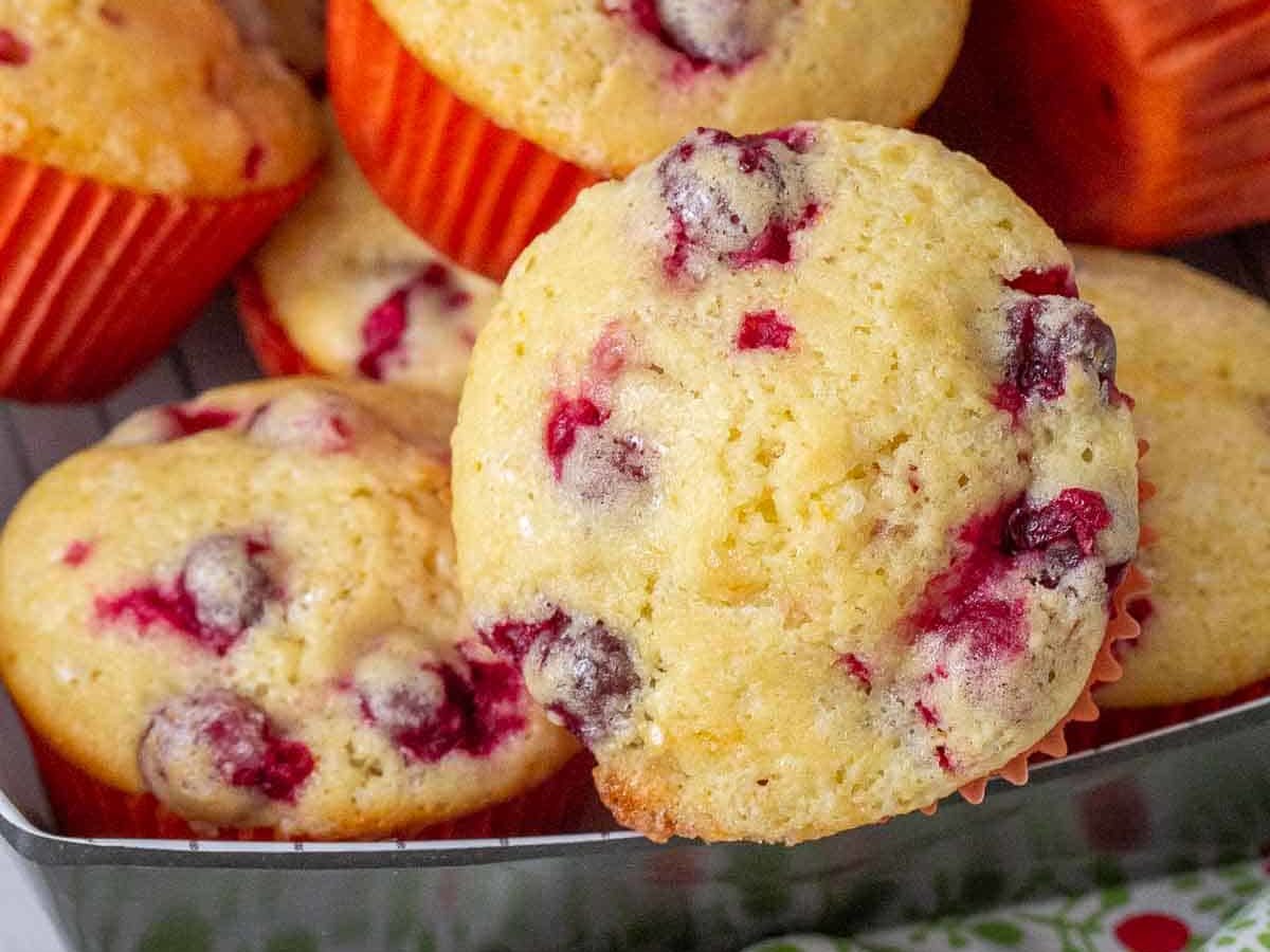 cranberry orange muffins stacked