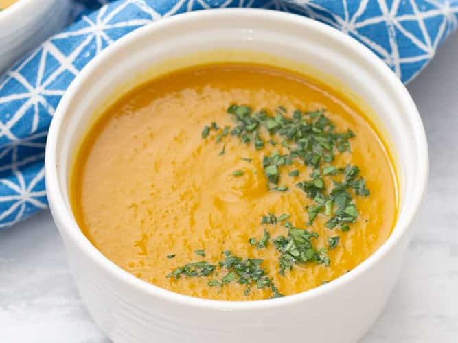 persimmon sweet potato soup with chopped parsley