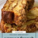 Close-up of two slices of eggnog French toast with a crumbly topping, placed on a plate. The text reads "Holiday Breakfast: eggnog french toast.