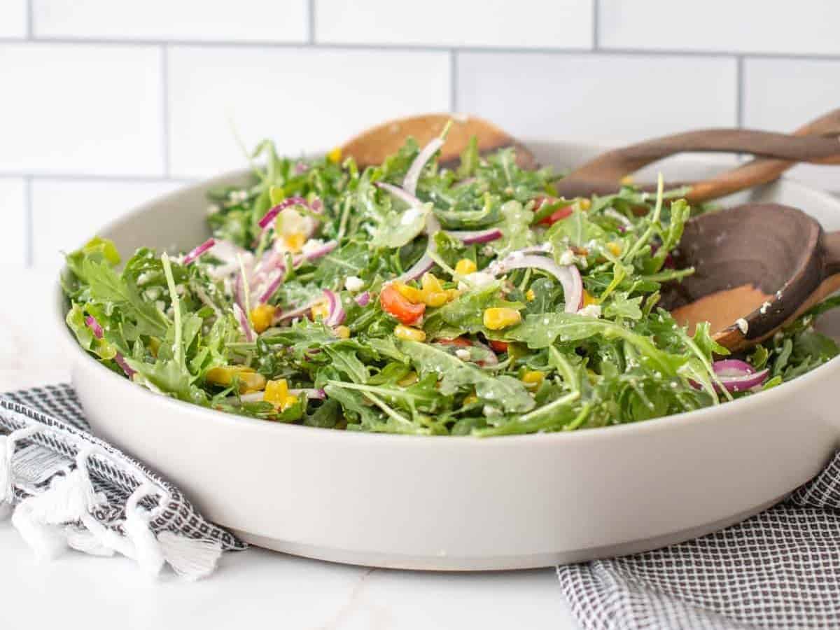 tossed roasted corn salad in a bowl