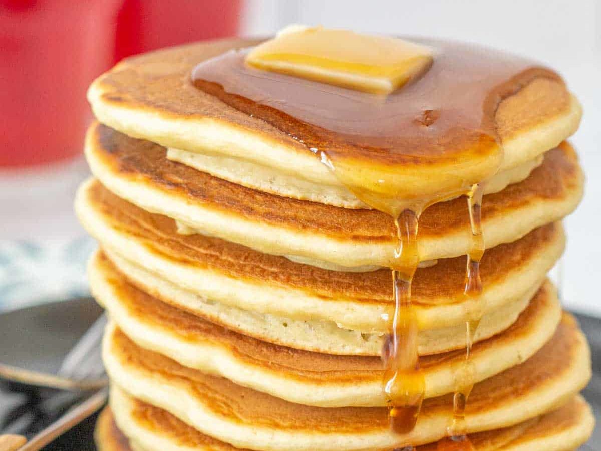 applesauce pancakes with syrup dripping