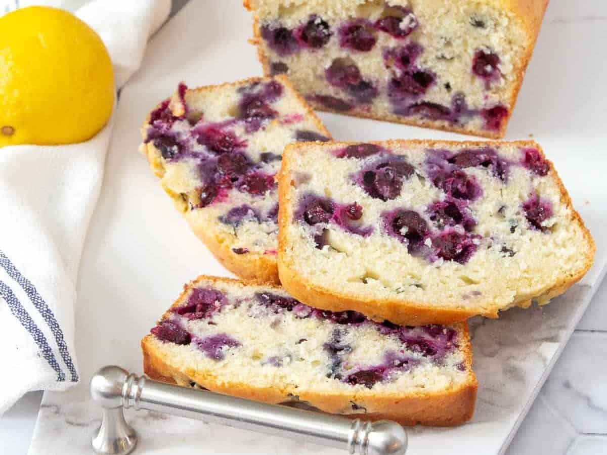 blueberry bread sliced on serving tray