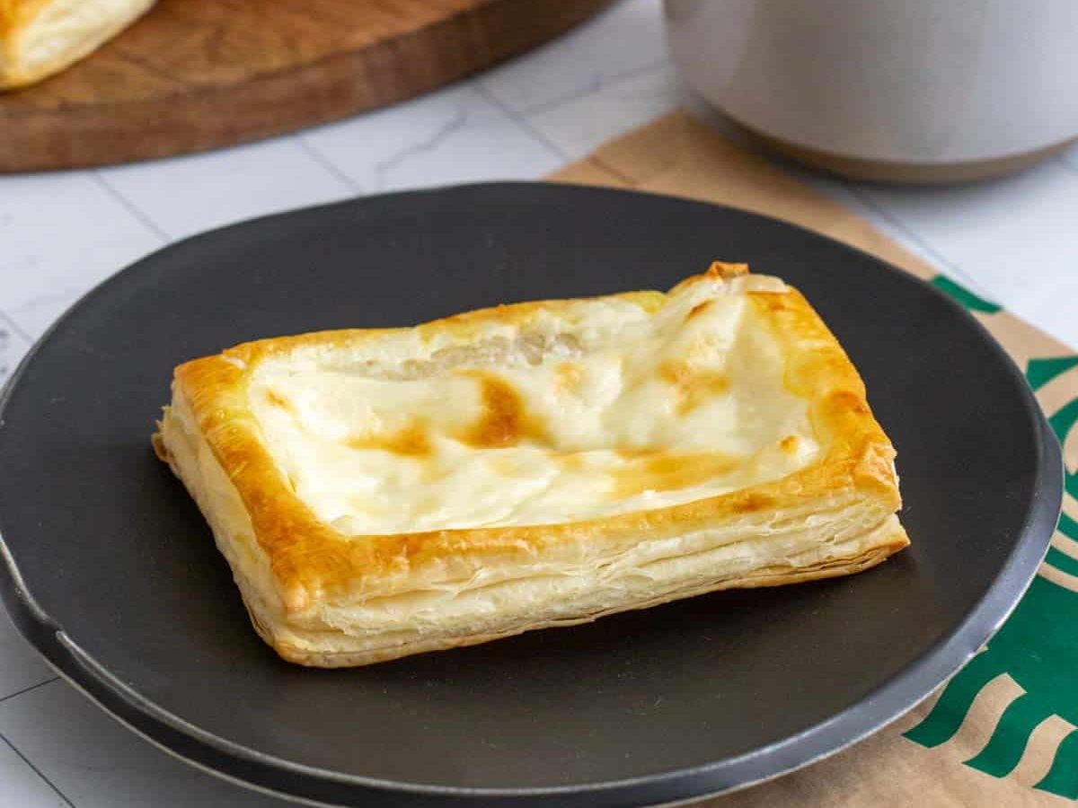 Starbucks cheese danish on black plate