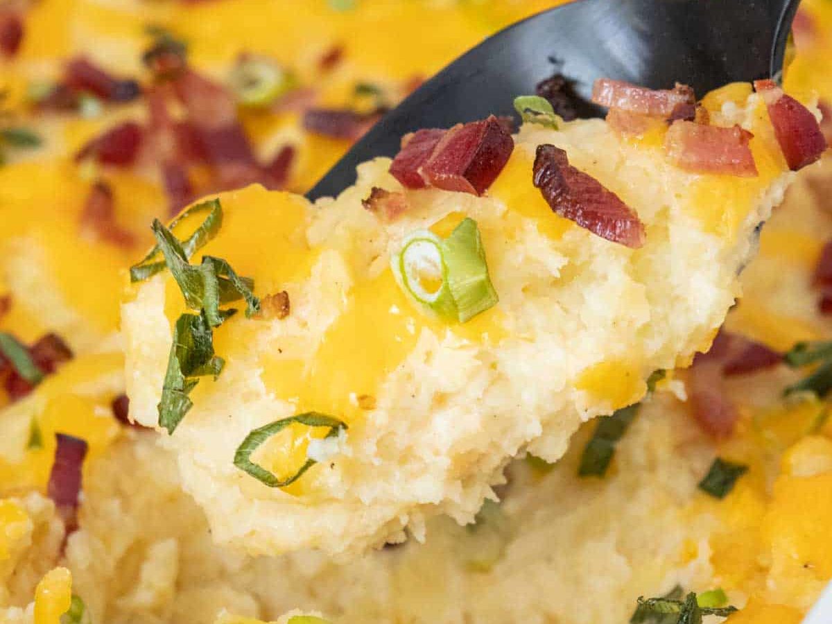 serving spoon of twice baked mashed potatoes