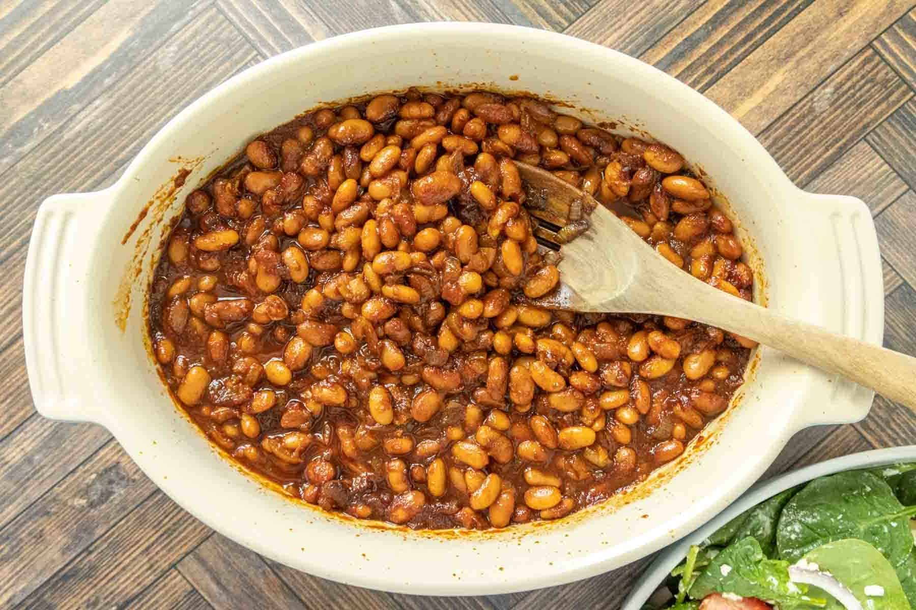 Overhead of vegetarian baked beans in a baking dish.