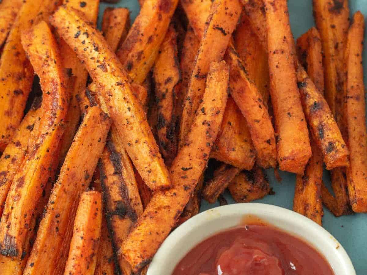 plate of carrot fries with ketchup