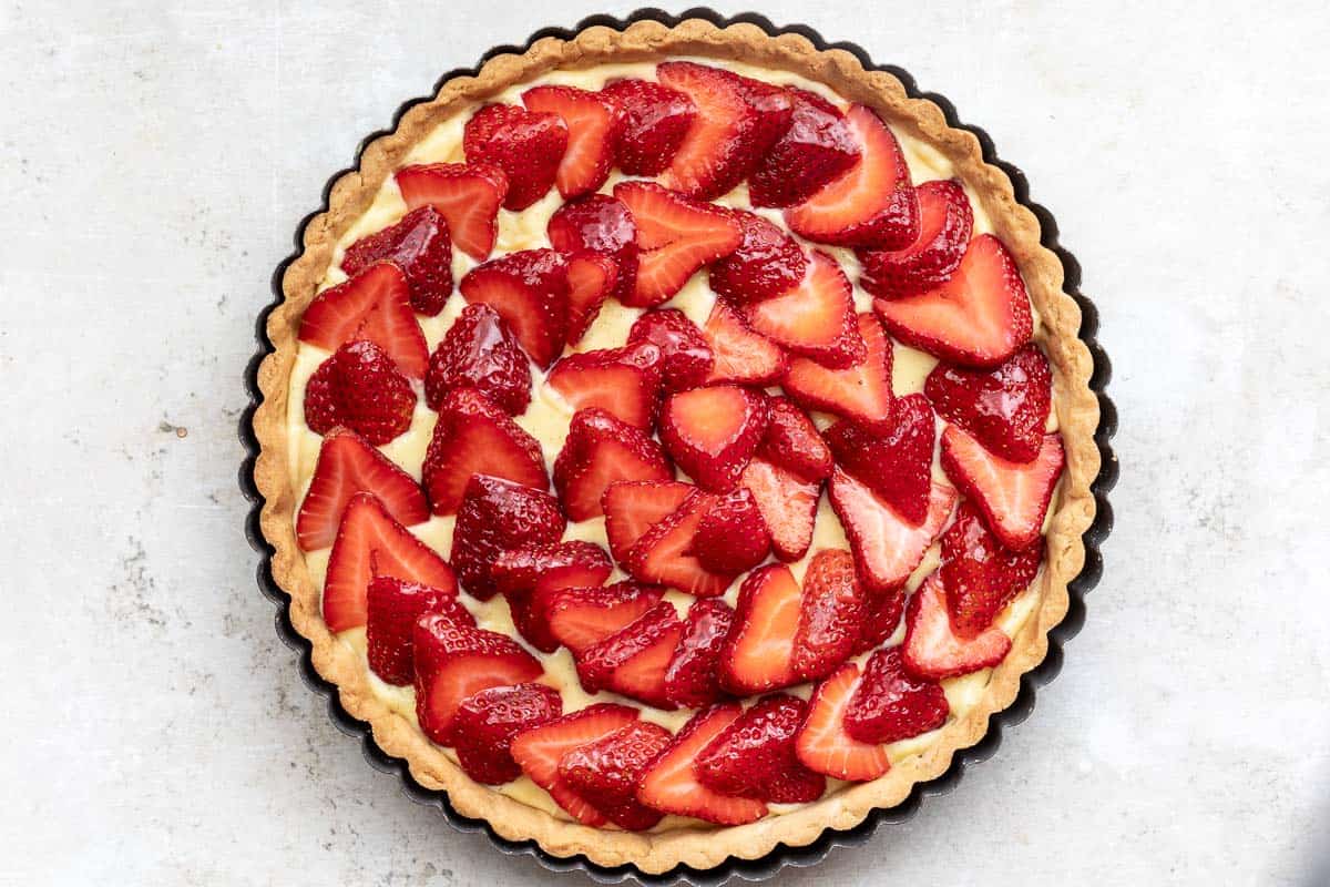 A strawberry tart as seen from overhead.